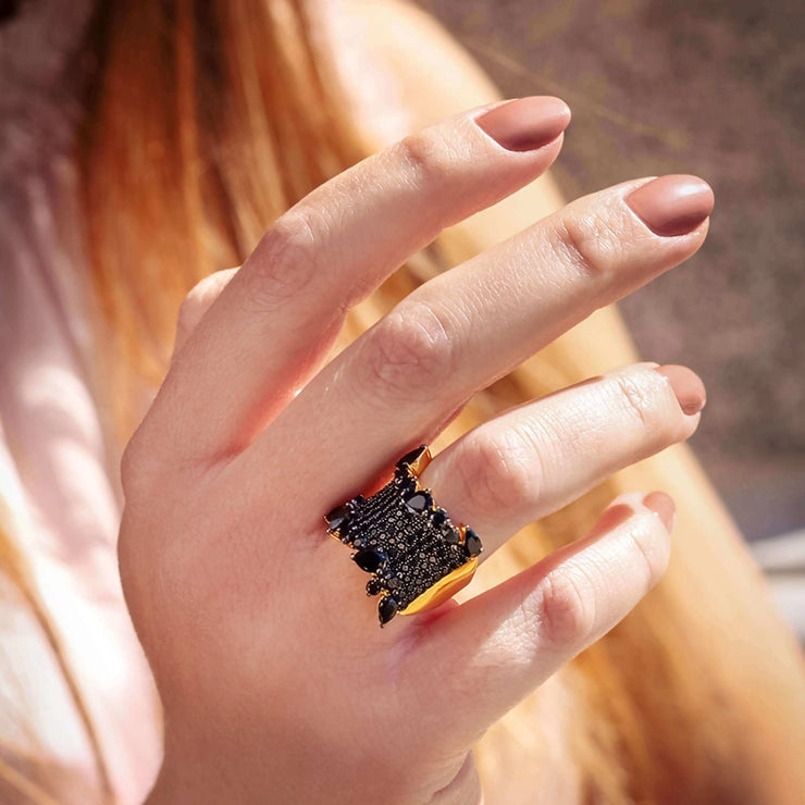 Woman wearing Ring with Authentic Natural Black Spinel Gemstone in Sterling 925 Silver and Gold Vermeil 18K